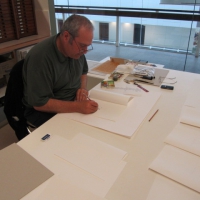 Eugene Carchesio making 'Thief of Light' (2010) at the SLQ Conservation department